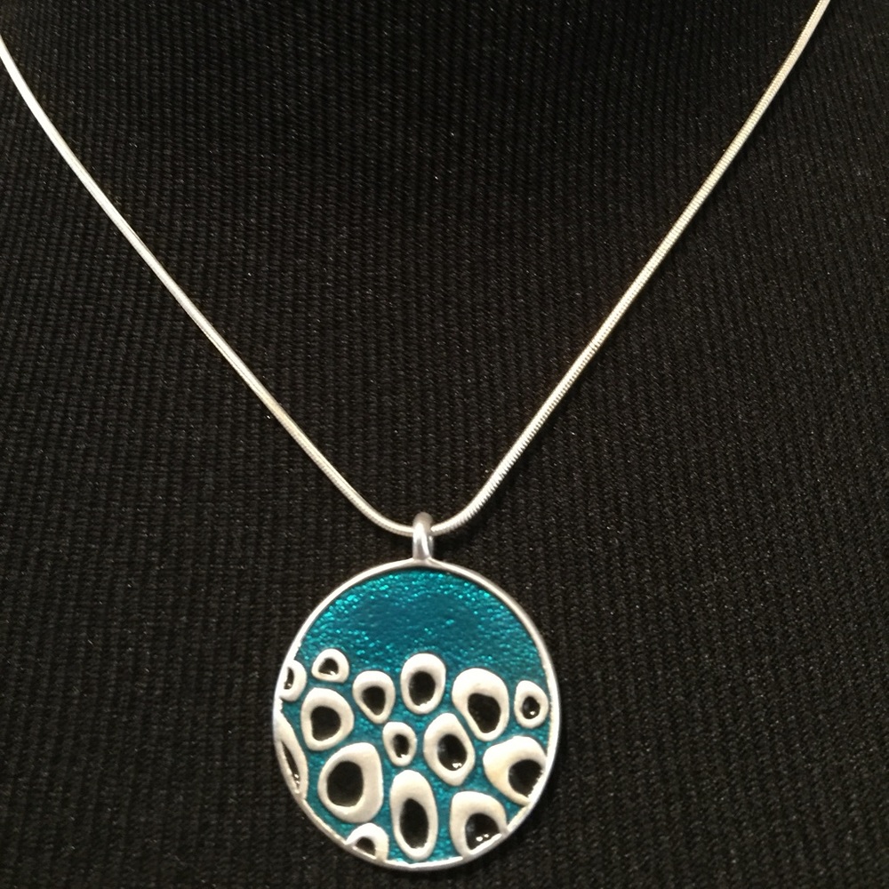 Double sided silver pendant and necklace