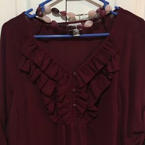 Maroon top with ruffles at neckline!