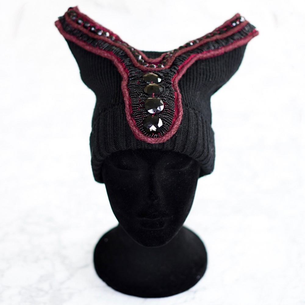 Like New, cute headed beanie.