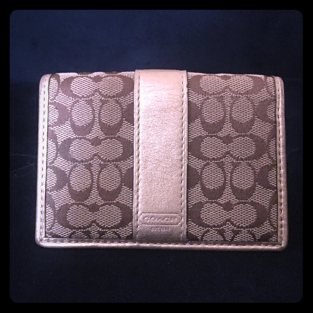 Coach signature gold, brown, and tan wallet
