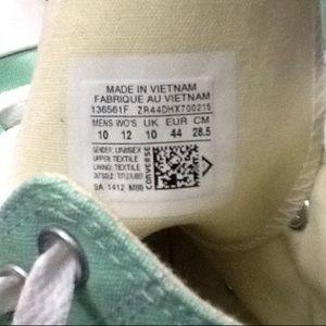 Mint green high top converse