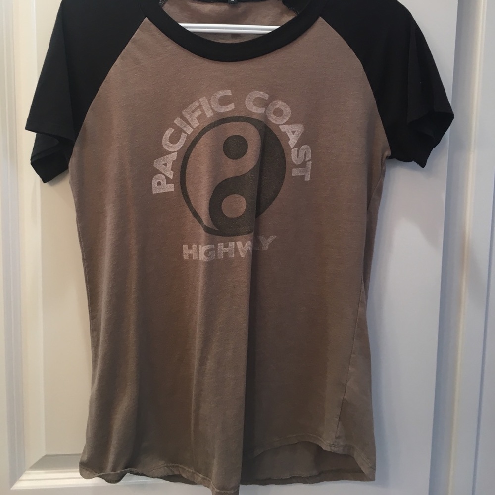 This is a off-green colored t-shirt.