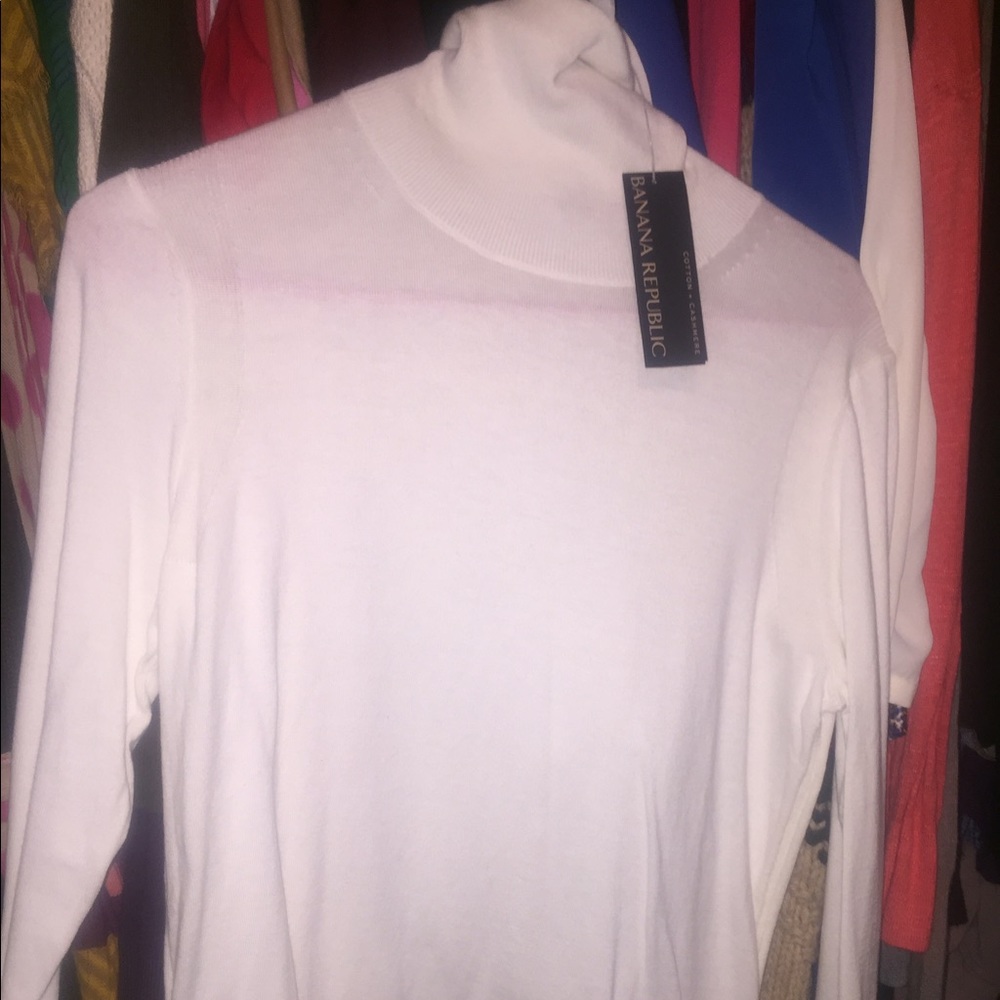 Cream fitted turtleneck sweater