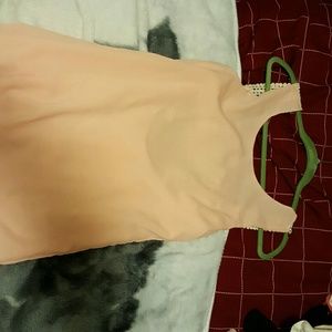 Soft pink shirt with nice crochet back