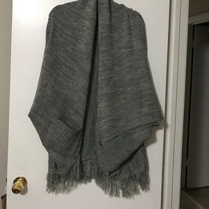 Grey, fringed sweater/cape. One size.