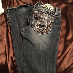 Miss me jeans has light staining on the knee area