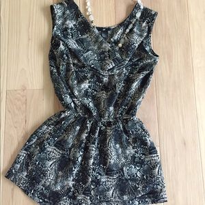 Draped neck romper that doesn't wrinkle!
