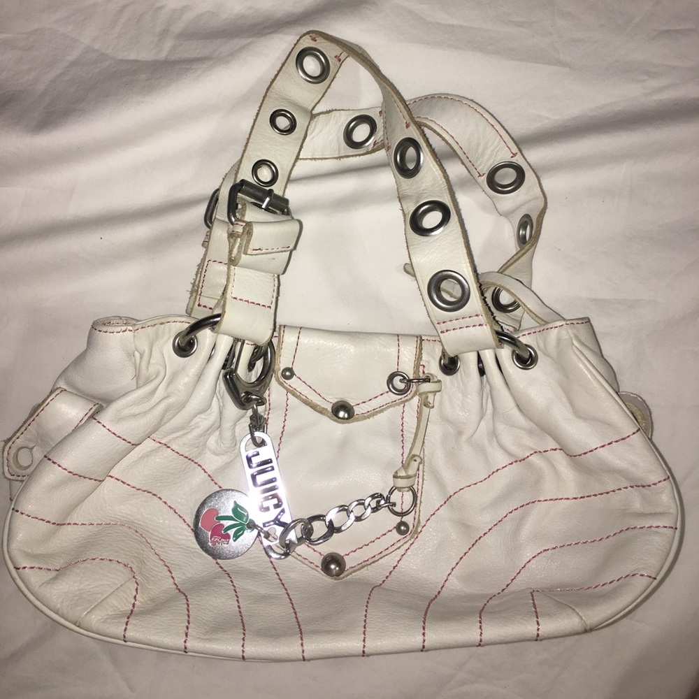 Juicy Couture white purse with pink stitching
