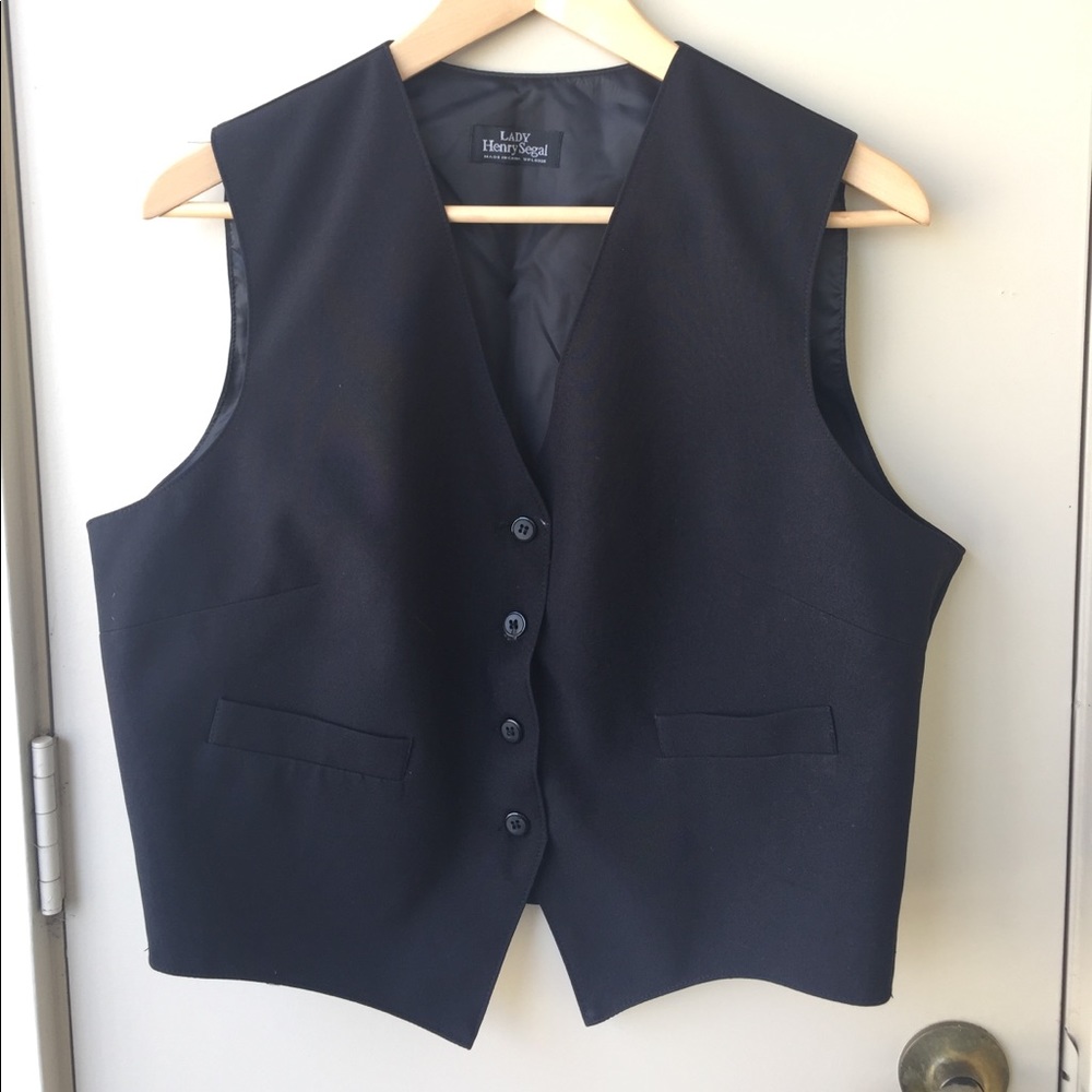 Two black vests never worn