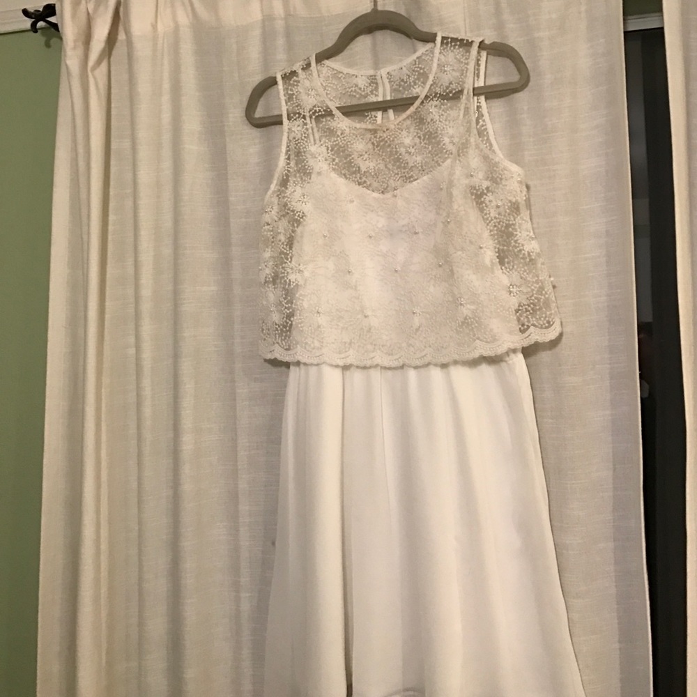 White 2-piece popover dress.