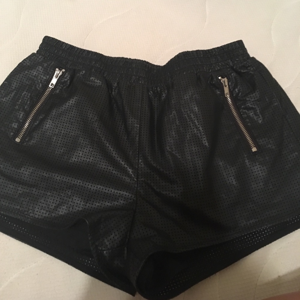 Black shorts with side zipper pocket