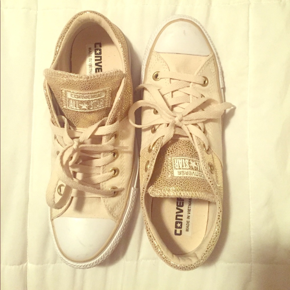 Gold low top Converse All Stars