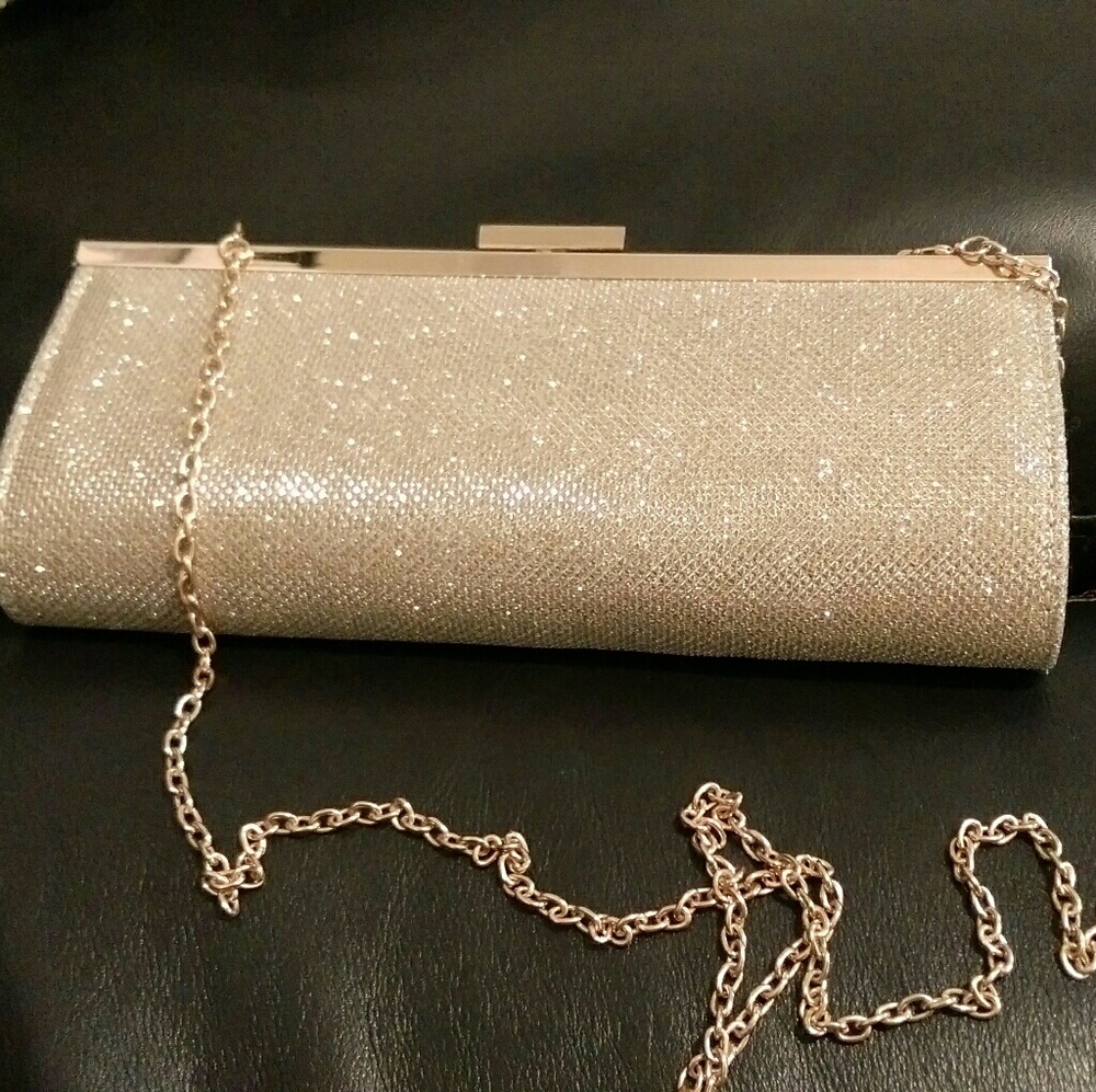 Charming Charlie.Gold clutch.Used once. Brand New.