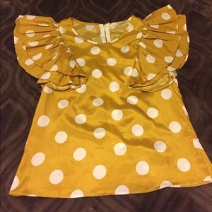 Ruffled sleeve polka dot top