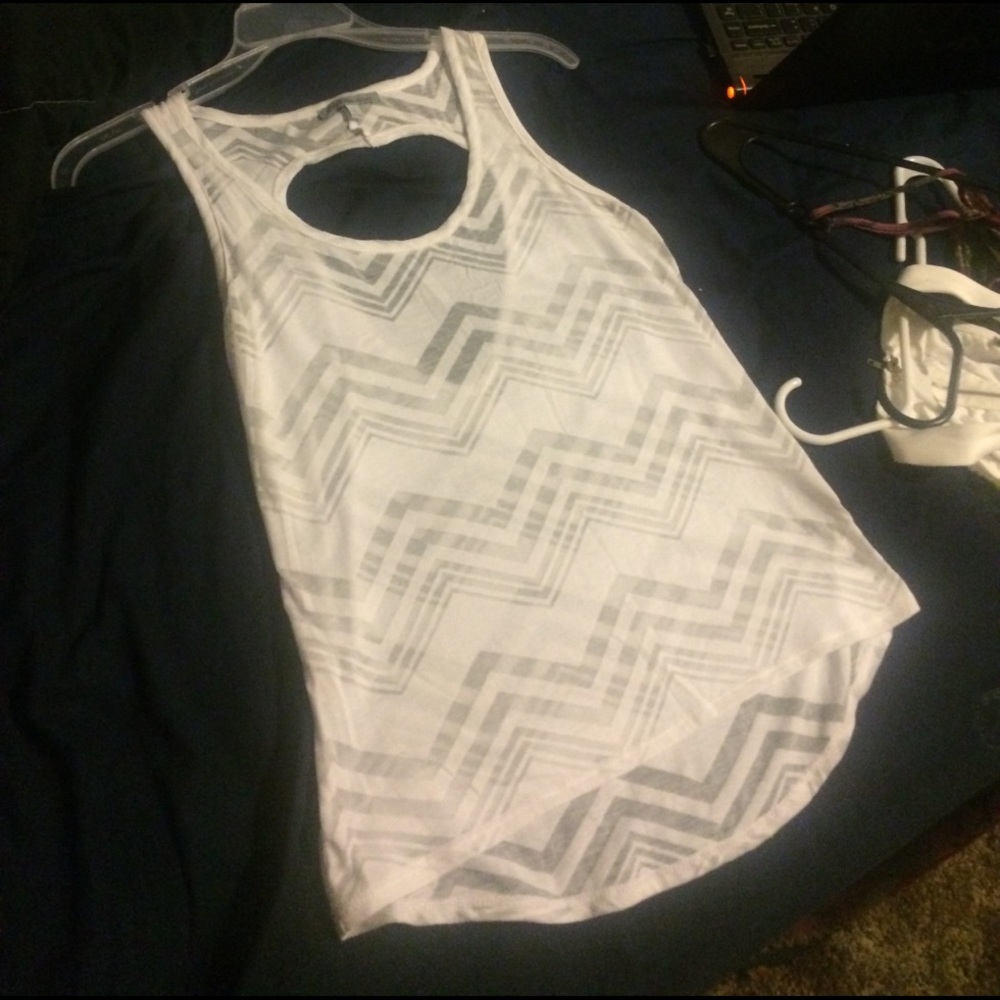 White tank top with heart-shaped in the back