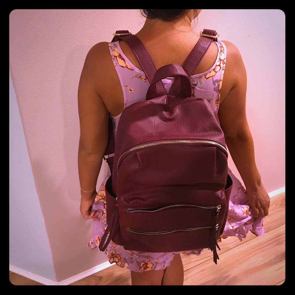 Brand new maroon vegan leather backpack