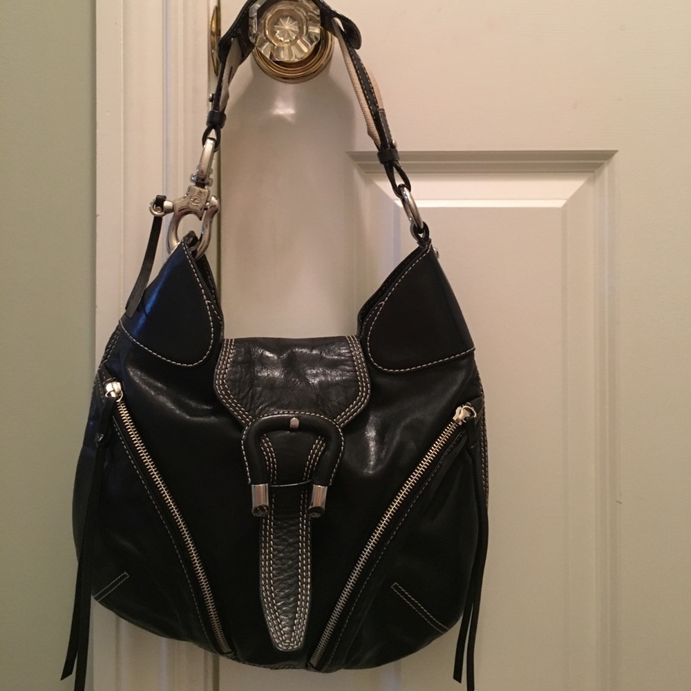 Black leather bag with canvas stitching