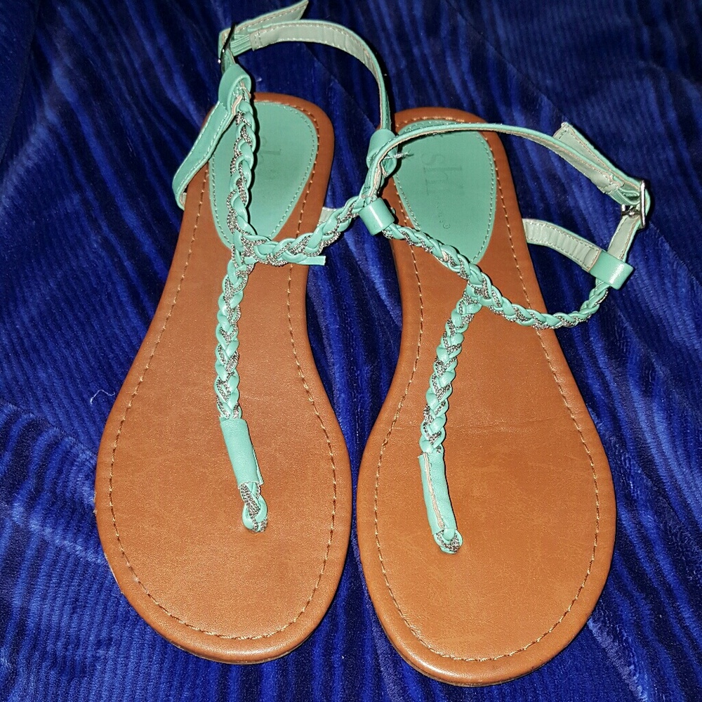 Shi brand sandals.