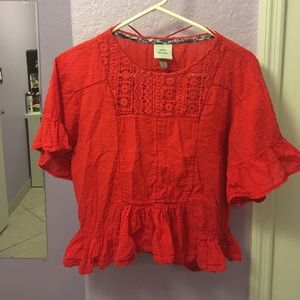 Red frilly blouse