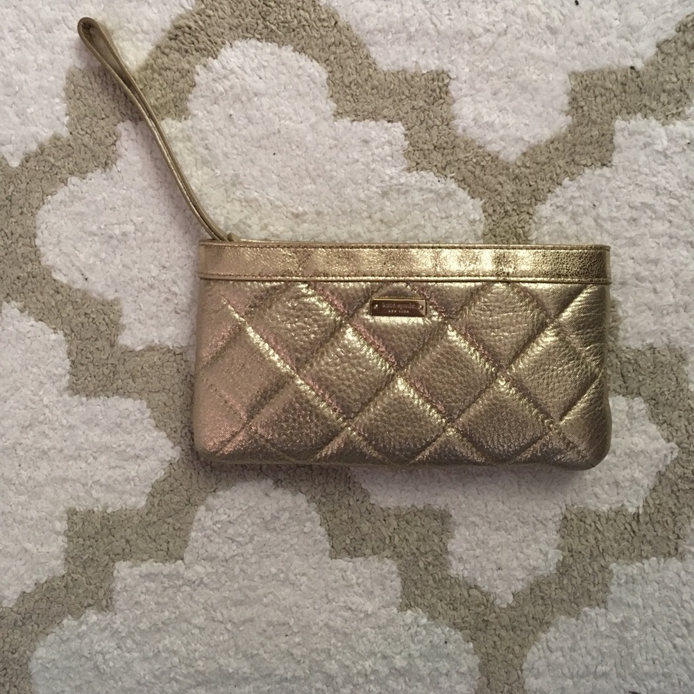 Kate Spade mini-clutch in gold