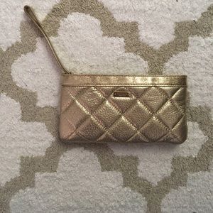 Kate Spade mini-clutch in gold