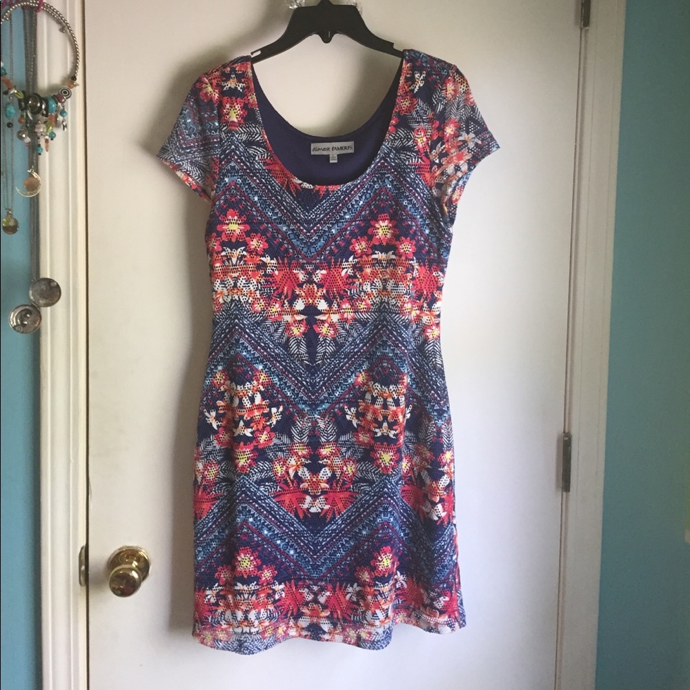 Tropical themed midi dress with lace like covering