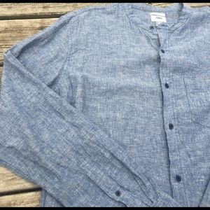 Collarless buttons down