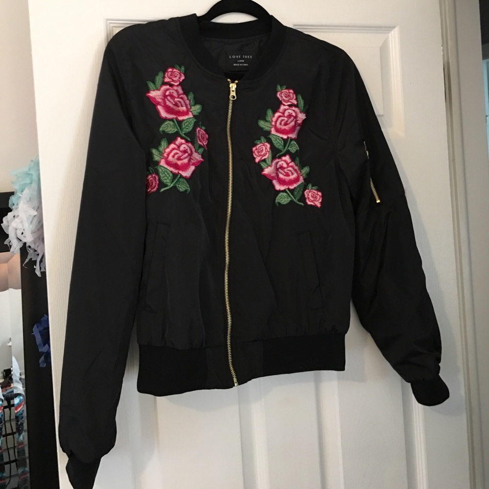 Black bomber with floral appliqué