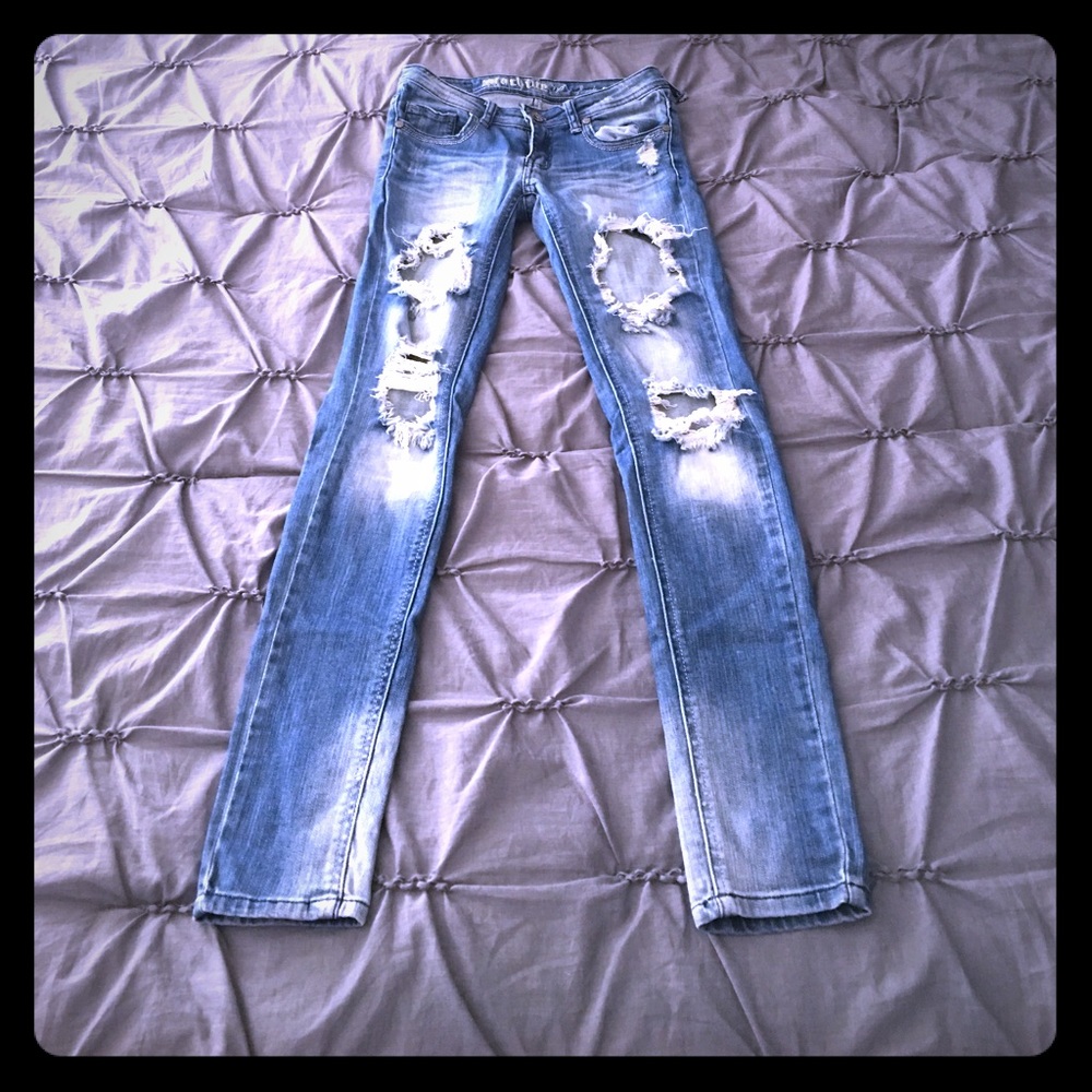 Distressed denim jeans