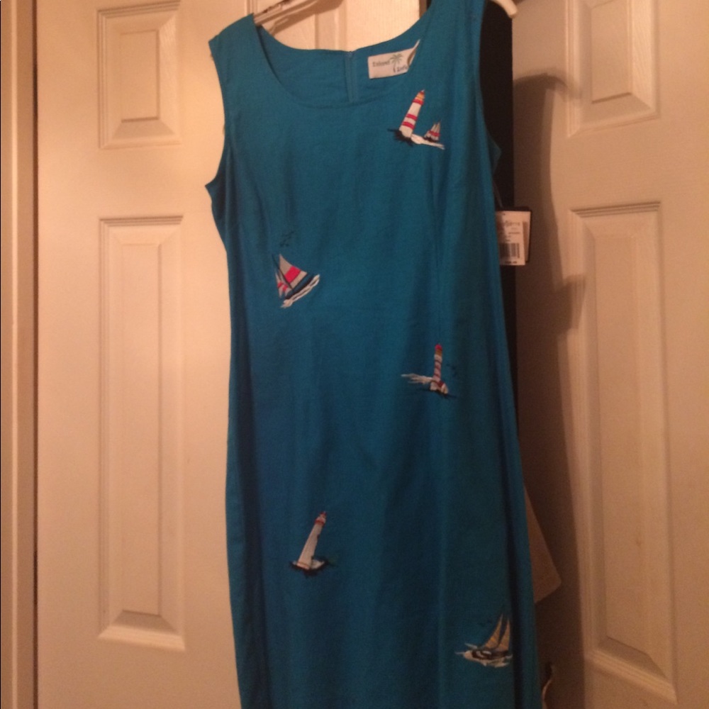 Blue dress with beach themed multicolored appliqué