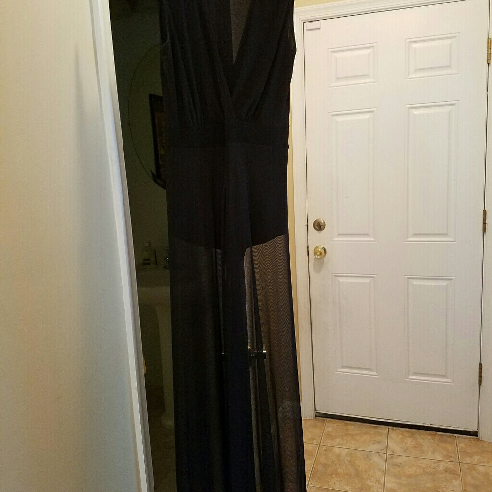 Black cover up, shorts underneath