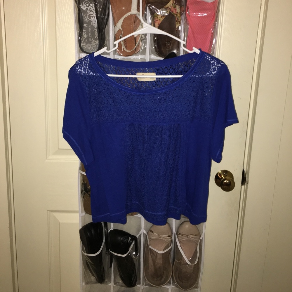 Hollister crotchet/solid royal blue top.