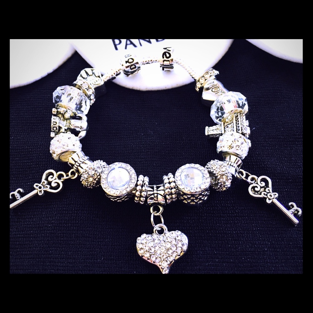 Pandora Engraved Bracelet with charms and pouch