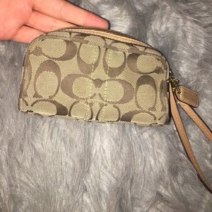 Super cute little coach bag.