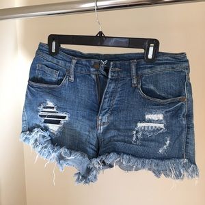 High waisted distressed jean shorts