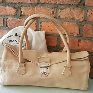 Prada creme leather barrel handbag