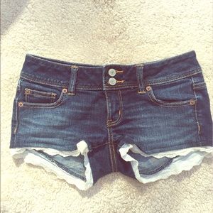 American Eagle denim shorts with lace trim size 0