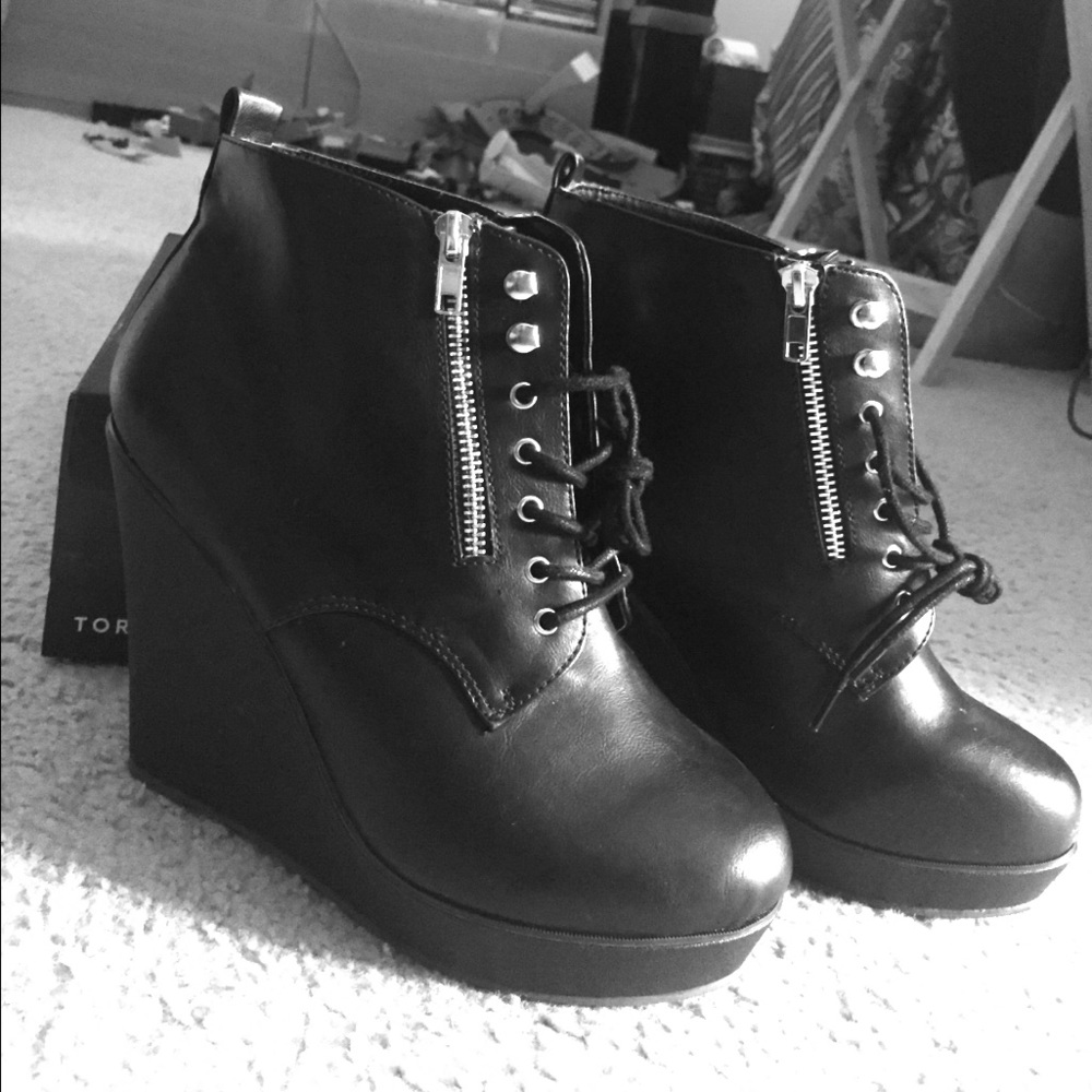 Lace up platform wedges.