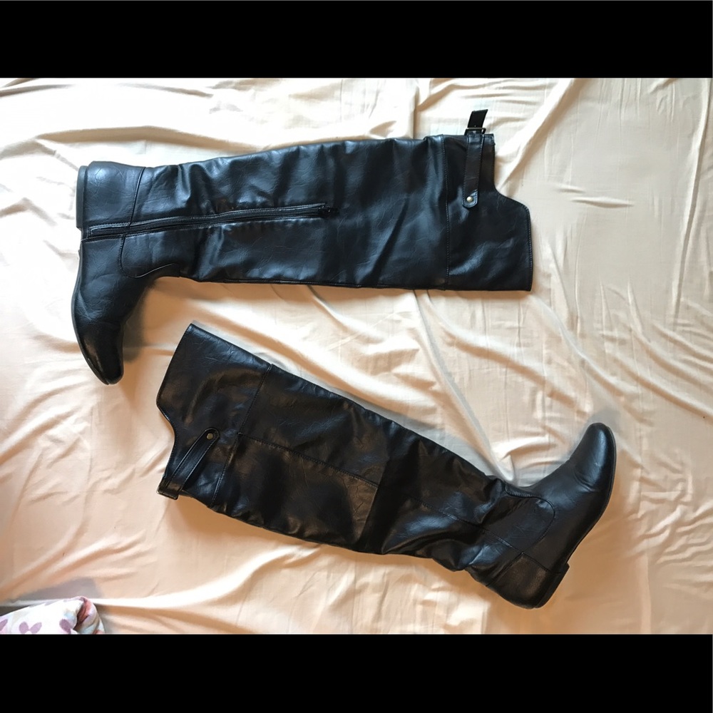 Over the knee black leather boots