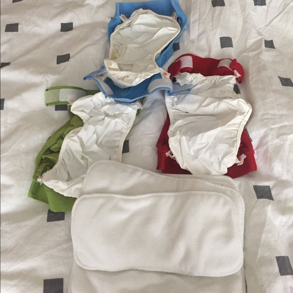 RESERVED three G diapers and inserts