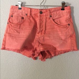 FREE PEOPLE orange denim cutoff shorts