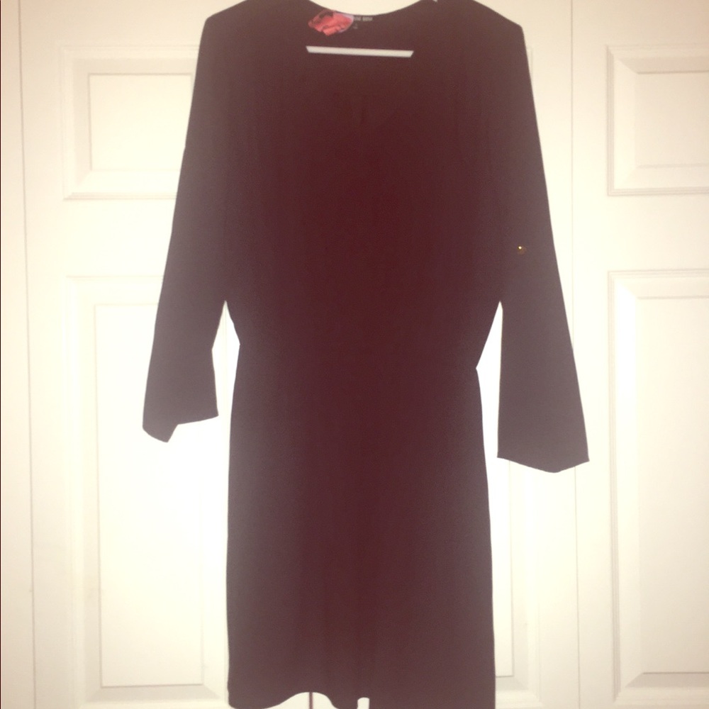 Gianni Bini black dress with roll tab sleeves.