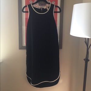Sporty black tank dress with white trim