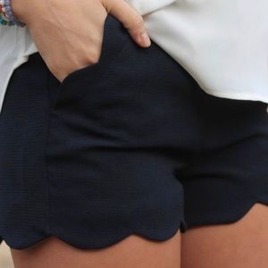 Black scallop shorts
