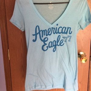 Blue American Eagle shirt.