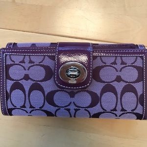 Authentic Brand new plum coach wallet with tags