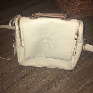 Roomy cream colored cross body
