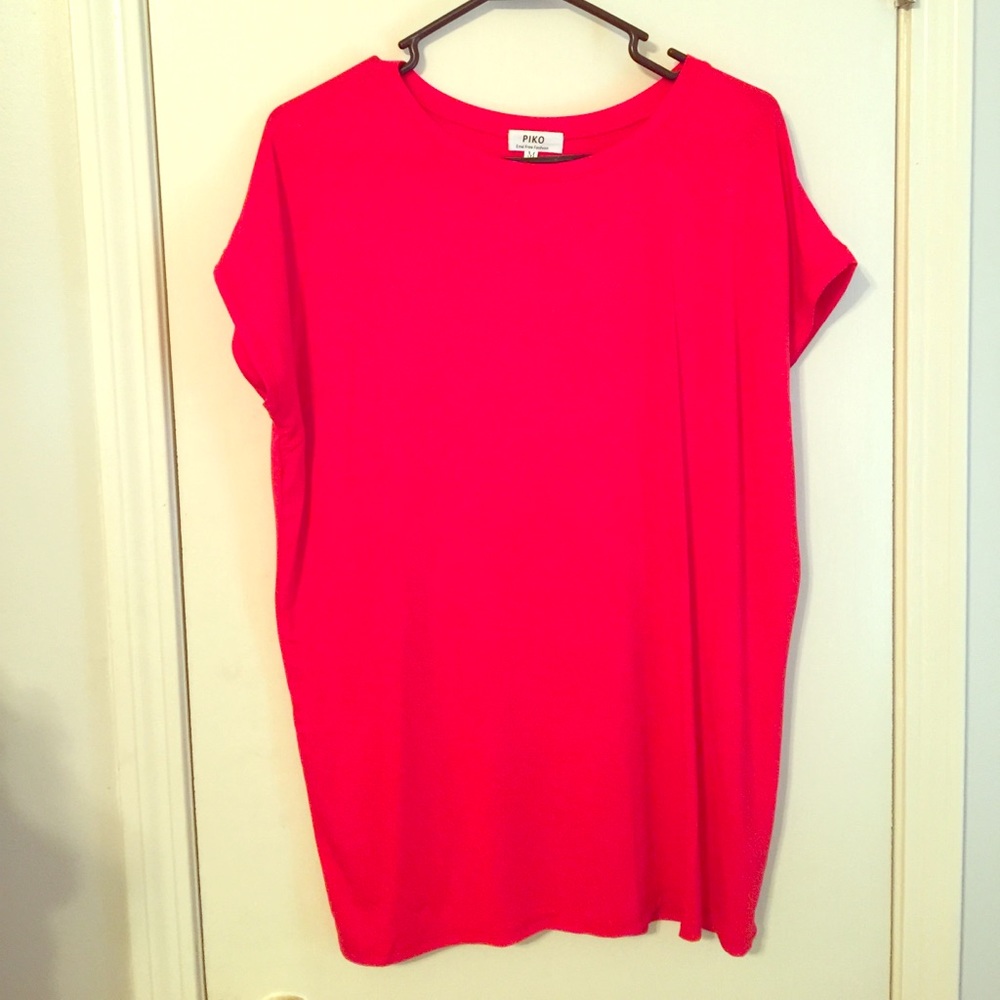 Never worn. PIKO short sleeve top