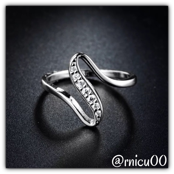 Boutique Jewelry - The "Wave" 18K White Gold & White Topaz Stone!