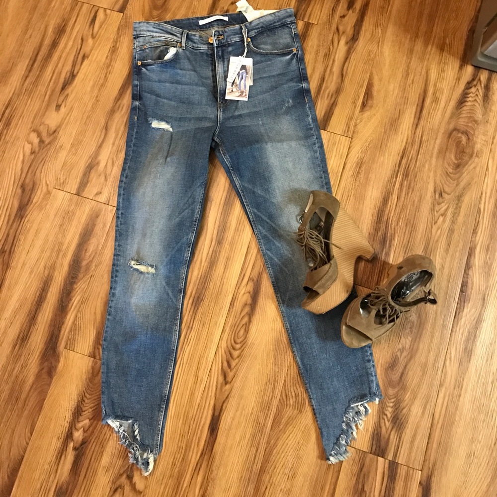 Distressed Zara brand jean.
